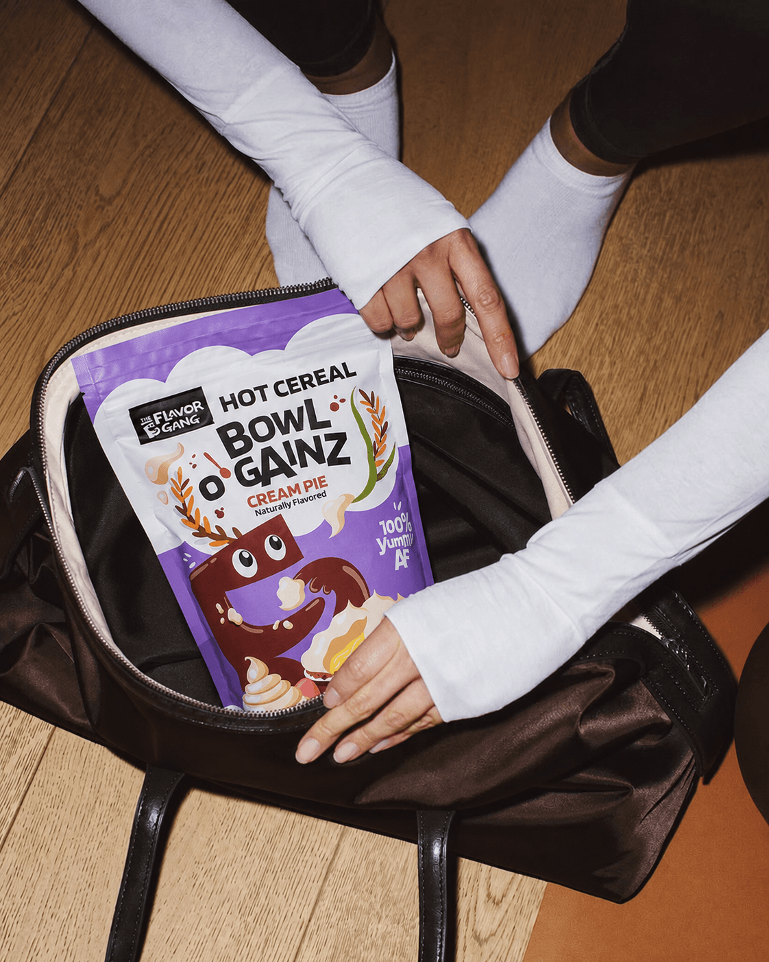 Bowl O' Gainz Cream Pie hot cereal being packed into a gym bag — macro-friendly cream of rice by The Flavor Gang